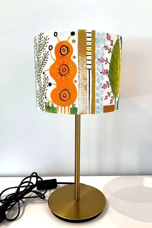 Side view of Yellow Bird Lamp hand painted by Marja-Leena